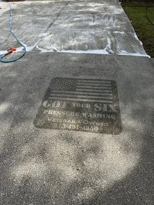 Professional paver sealing and pool deck cleaning on a residential property